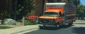 Mold and Water Damage Restoration Truck At Job Location